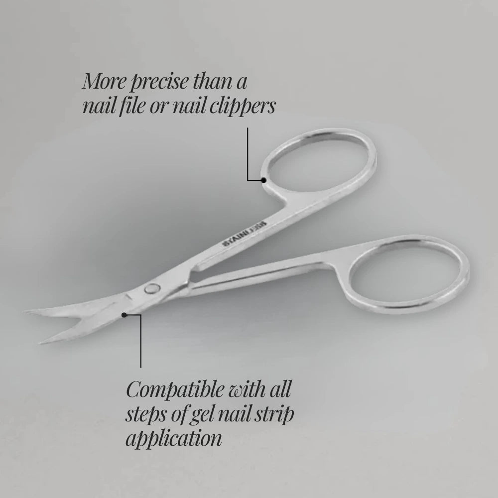 Pair of scissors on a gray background with text about its use.